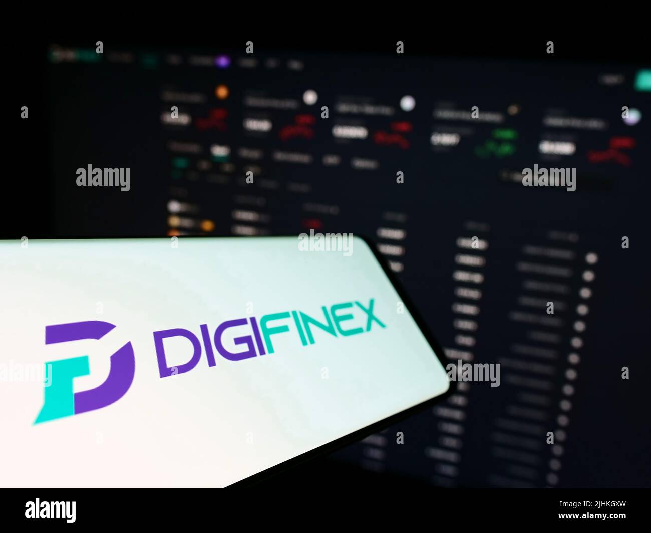 Mobile phone with logo of crypto exchange company DigiFinex Limited on  screen in front of business website. Focus on center-left of phone display  Stock Photo - Alamy