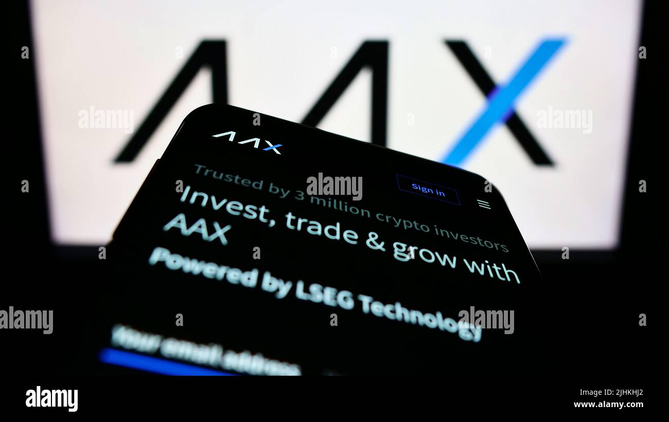 Smartphone with website of cryptocurrency exchange company AAX Limited ...