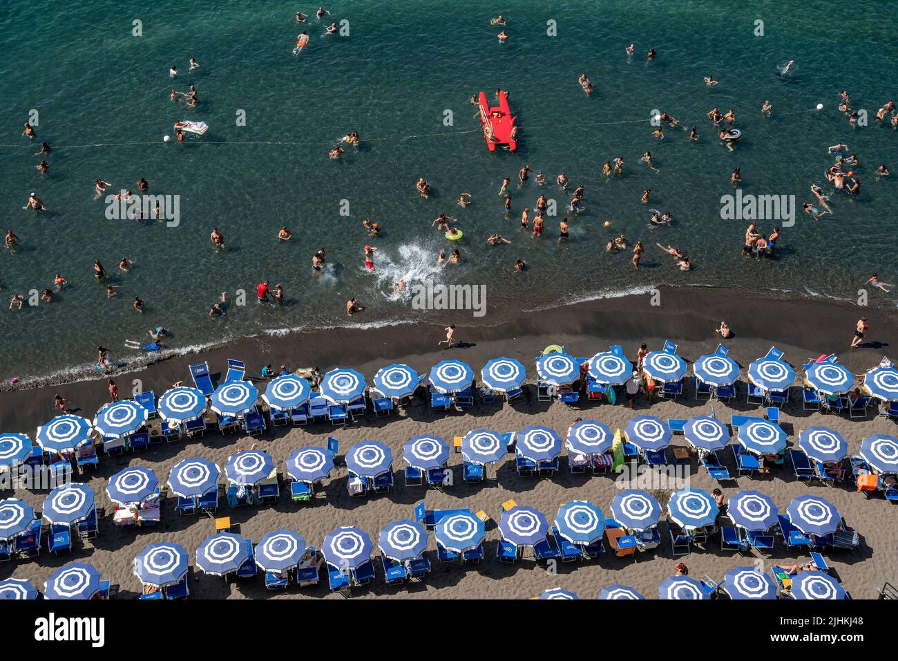 Swimming in Sorrento  a coastal town in southwestern Italy, facing the Bay of Naples on the Sorrentine Peninsula. Italy. Stock Photo