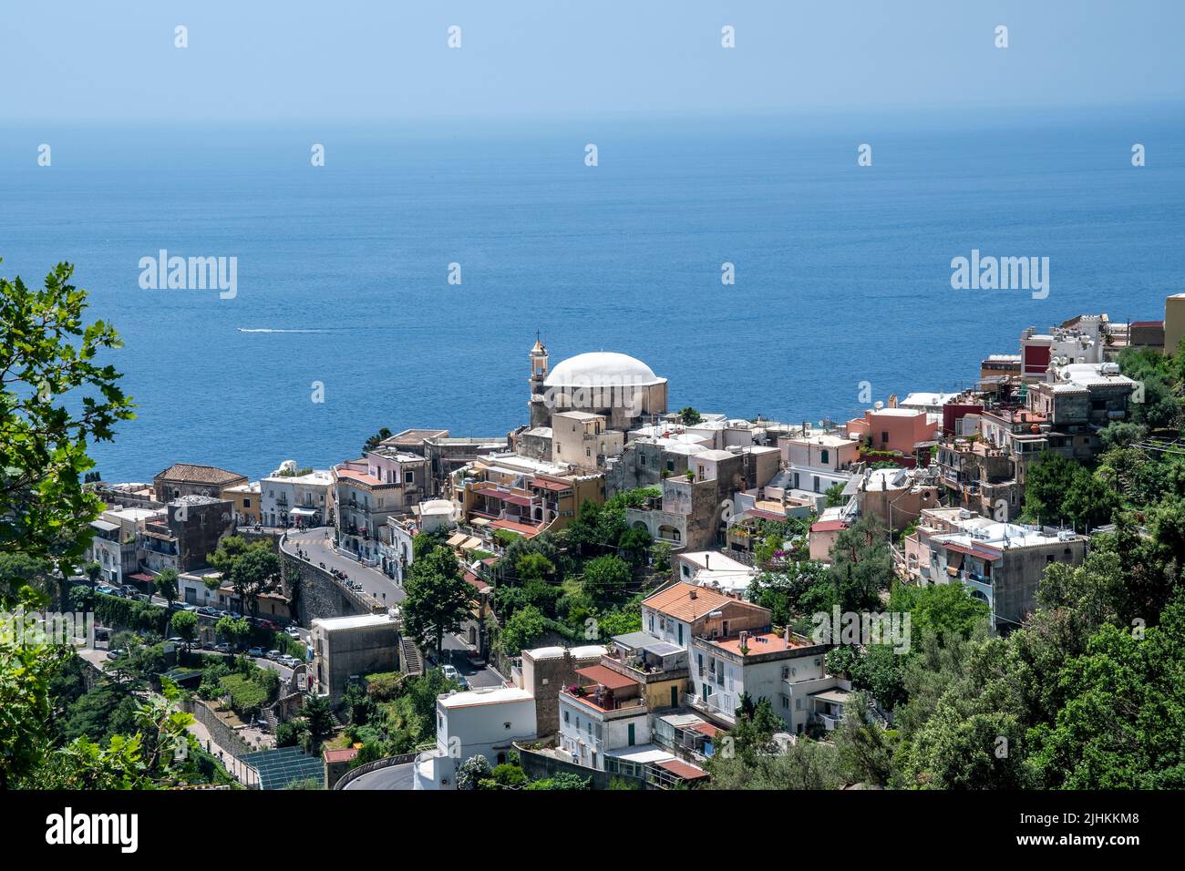 Positano is a cliffside village on southern Italy's Amalfi Coast. showing New Church. Dedicated to Our Lady of Graces overlooking Amalfi Coast Stock Photo