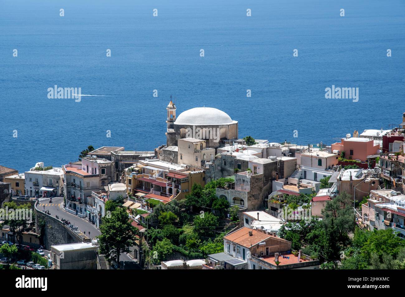 Positano is a cliffside village on southern Italy's Amalfi Coast. showing New Church. Dedicated to Our Lady of Graces overlooking Amalfi Coast Stock Photo