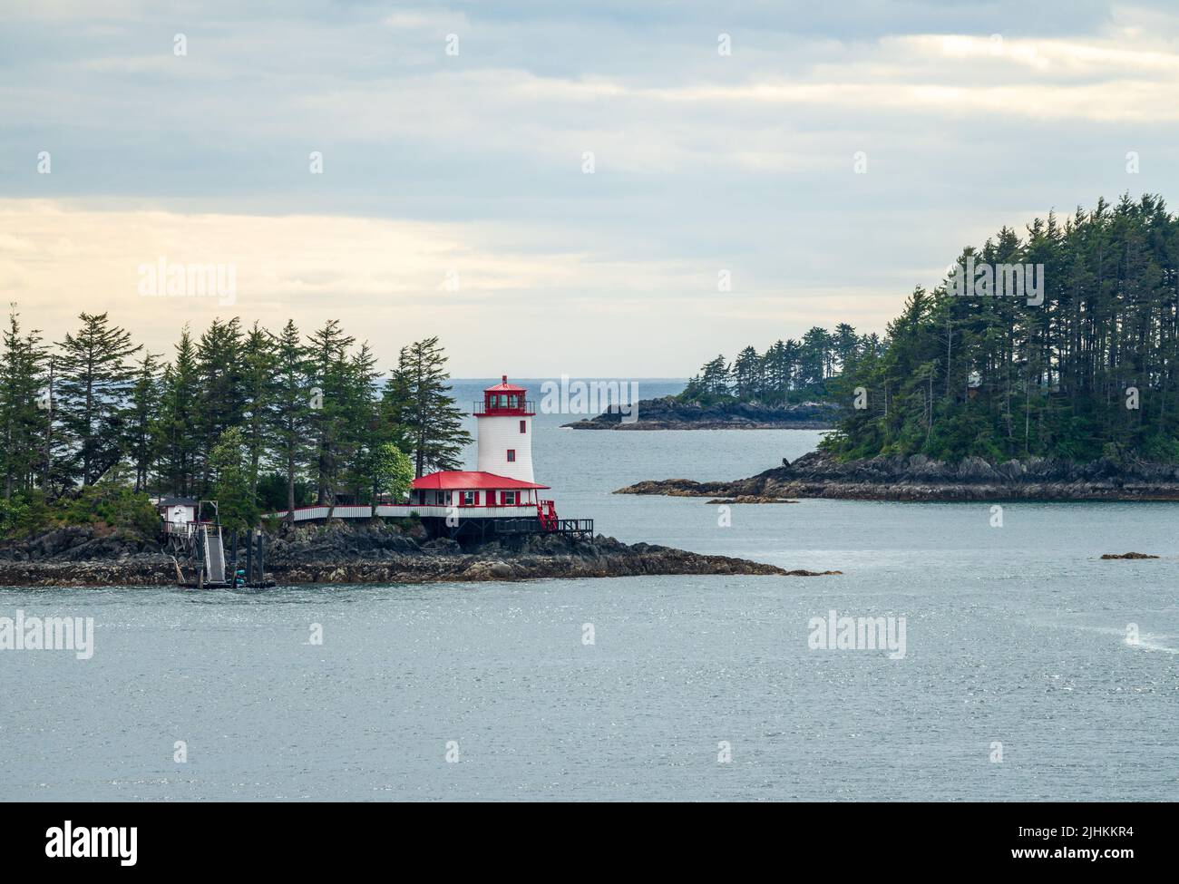 Light house on the rocks on island in the bay of Sitka in Alaska Stock Photo