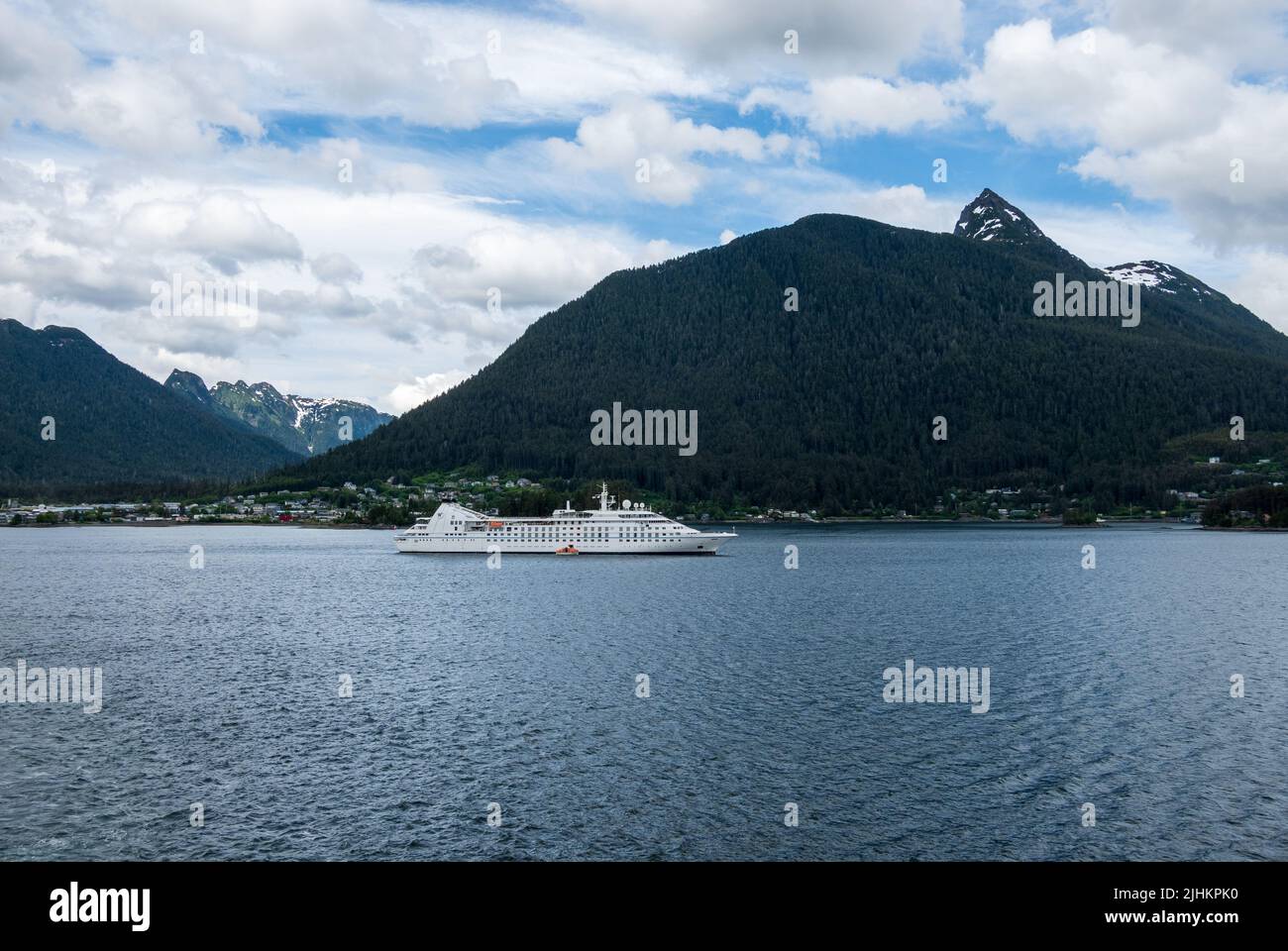 Sitka, AK - 8 June 2022: Windstar Star Breeze cruise ship anchored in Sitka bay in Alaska Stock Photo