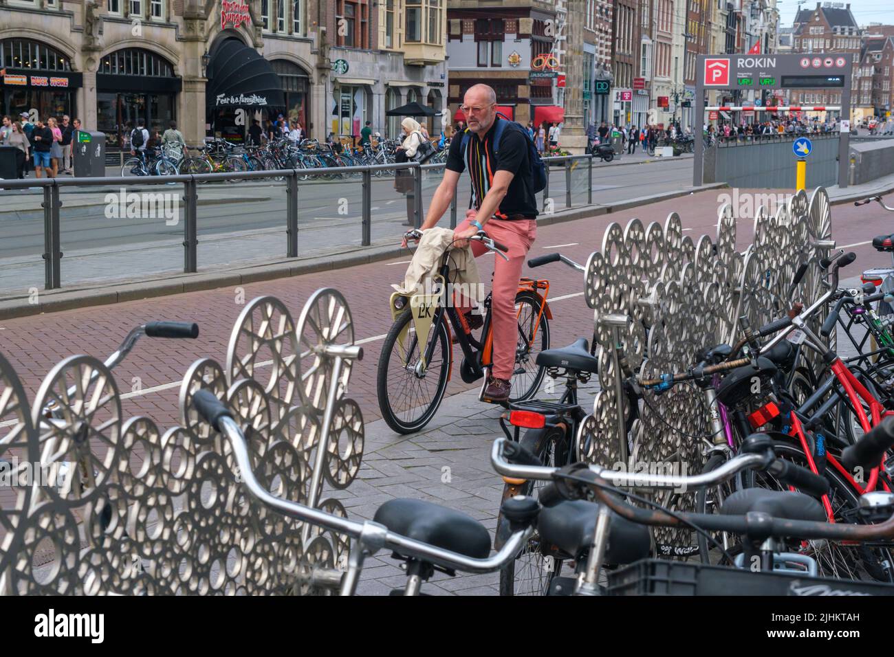 Amsterdam, Netherlands - 21 June 2022: Many bikes in bike racks Stock Photo
