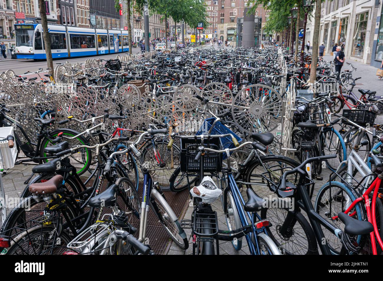 Amsterdam, Netherlands - 21 June 2022: Hundreds of bikes in bike racks Stock Photo