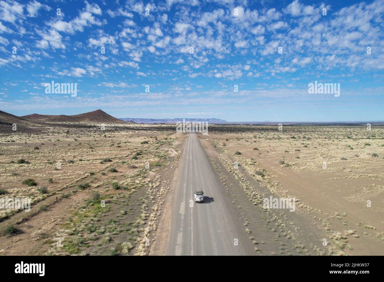 A 4x4 on a gravel road in Namibia Africa Stock Photo