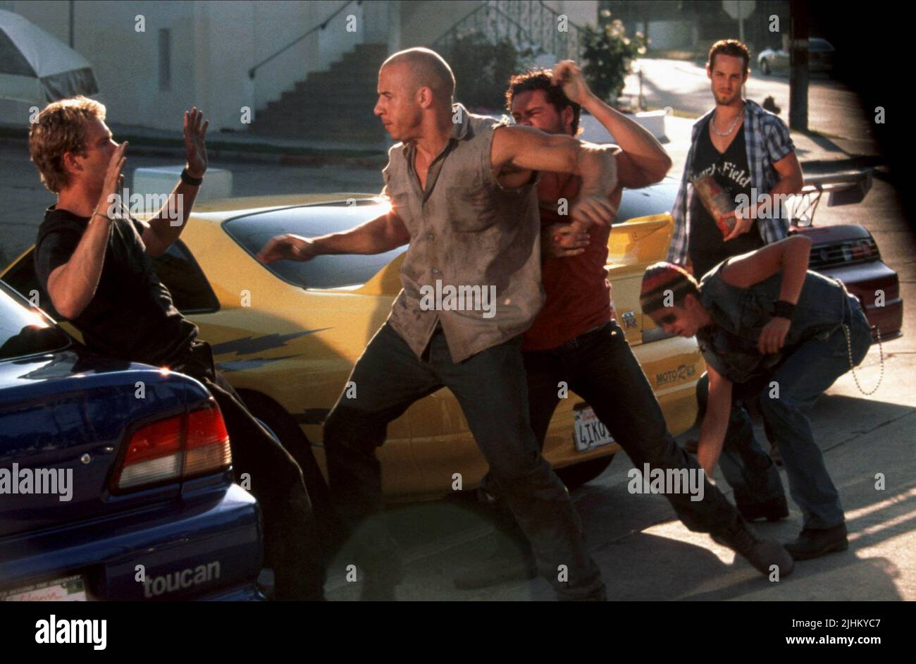 PAUL WALKER, VIN DIESEL, MATT SCHULZE, CHAD LINDBERG, JOHNNY STRONG, THE FAST AND THE FURIOUS, 2001 Stock Photo