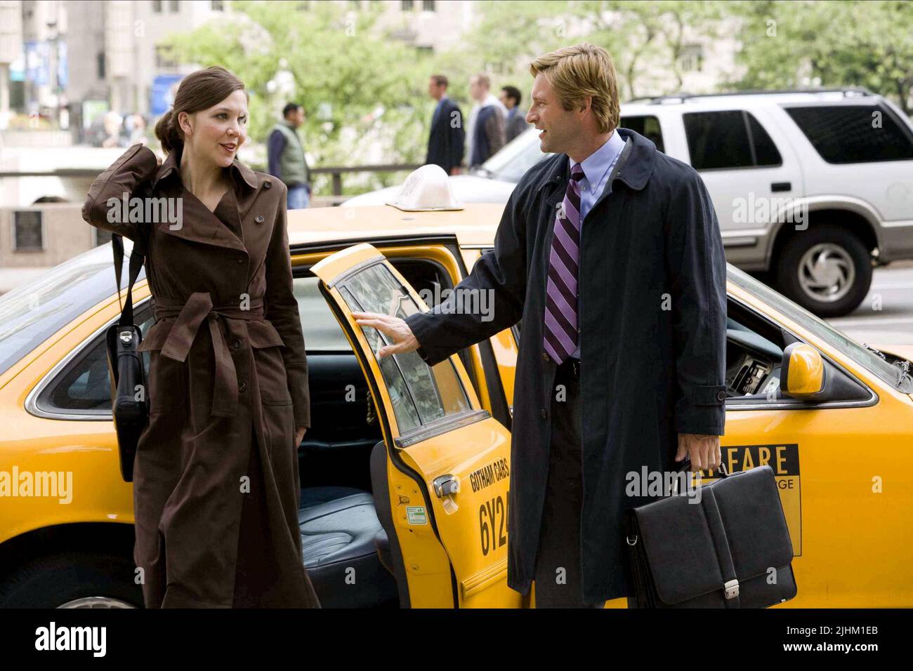 MAGGIE GYLLENHAAL, AARON ECKHART, THE DARK KNIGHT, 2008 Stock Photo