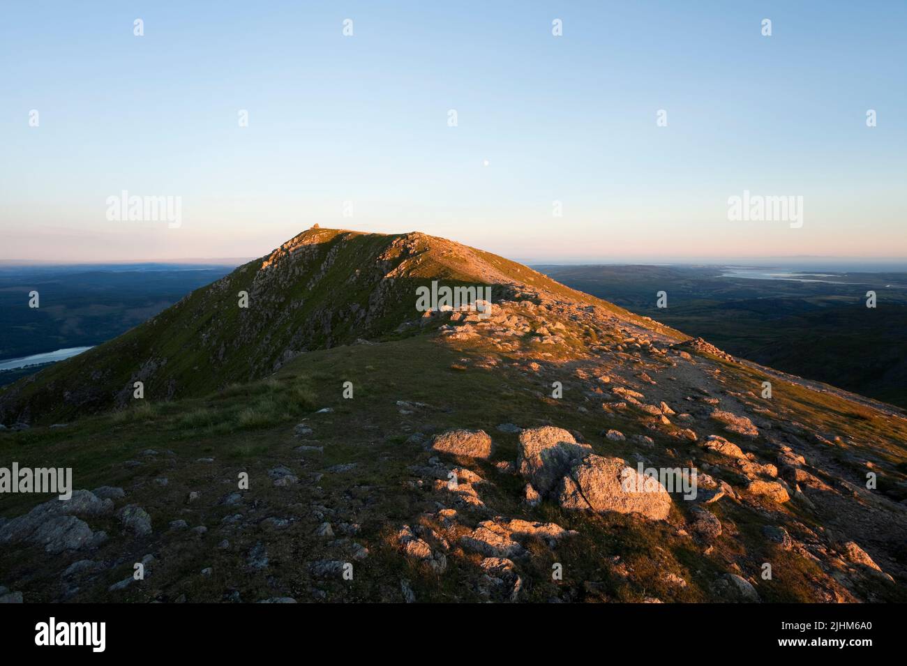 The summit crag of Coniston Old Man seen from neighbouring Brim Fell, in the English Lake District Stock Photo