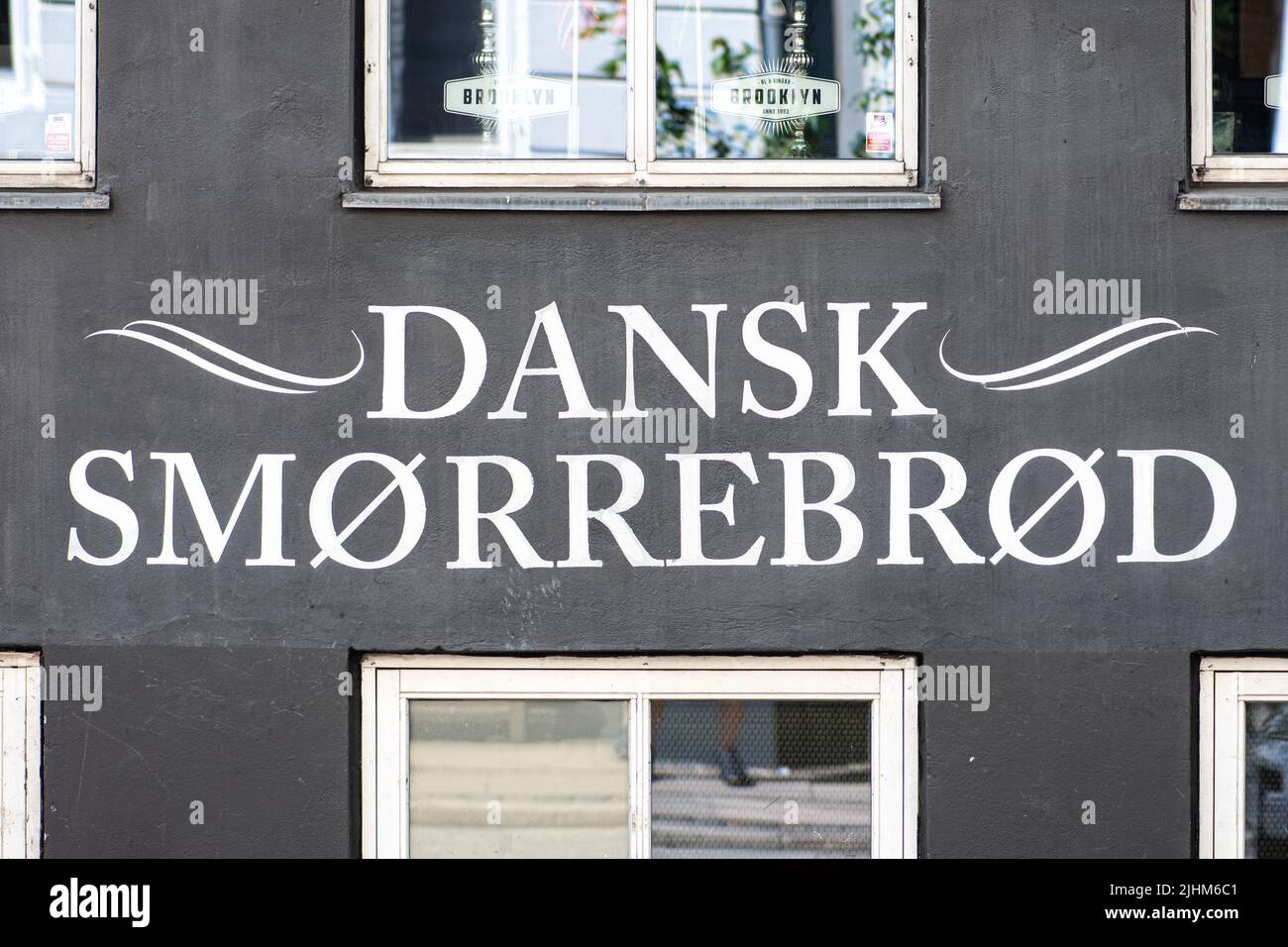 Facade of a restaurant  Dansk Smørrebrød, traditional open-faced sandwich in the cuisine of Denmark, Norway and Sweden, piece of buttered rye bread Stock Photo