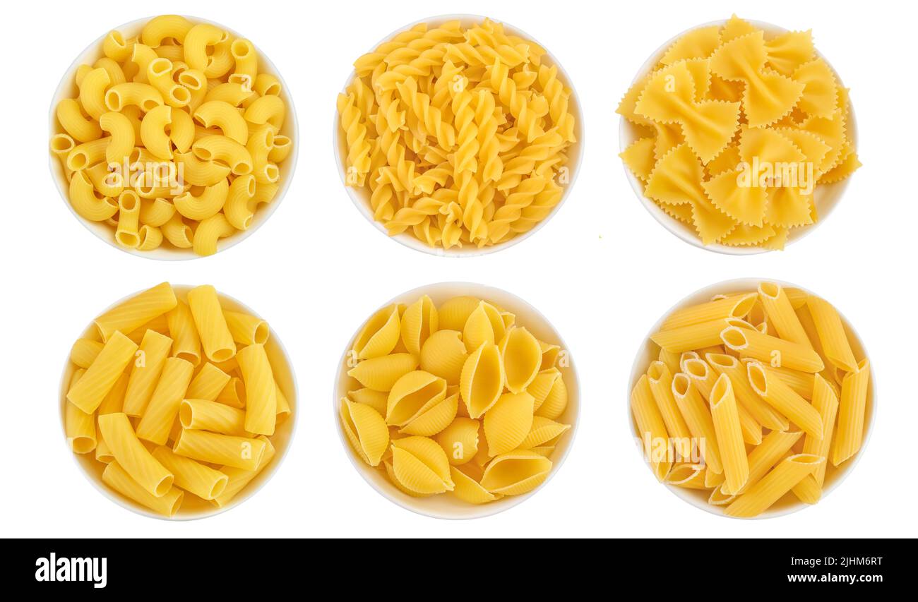Raw italian pasta in ceramic bowl isolated on white background. Top view. Flat lay. Set or collection Stock Photo
