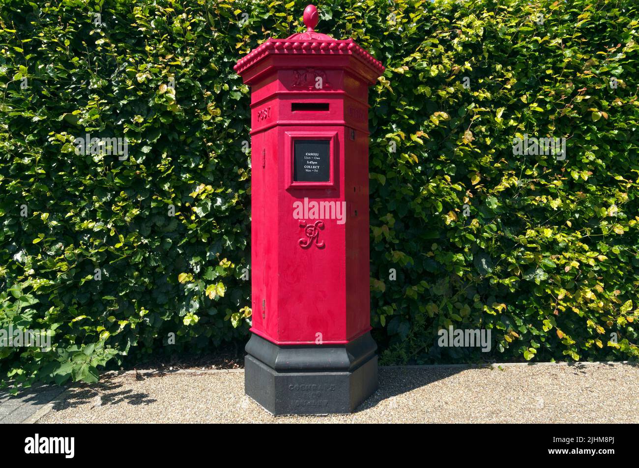 Victorian red pillar box post box at St Fagans Museum, Cardiff. Summer 2022. July Stock Photo