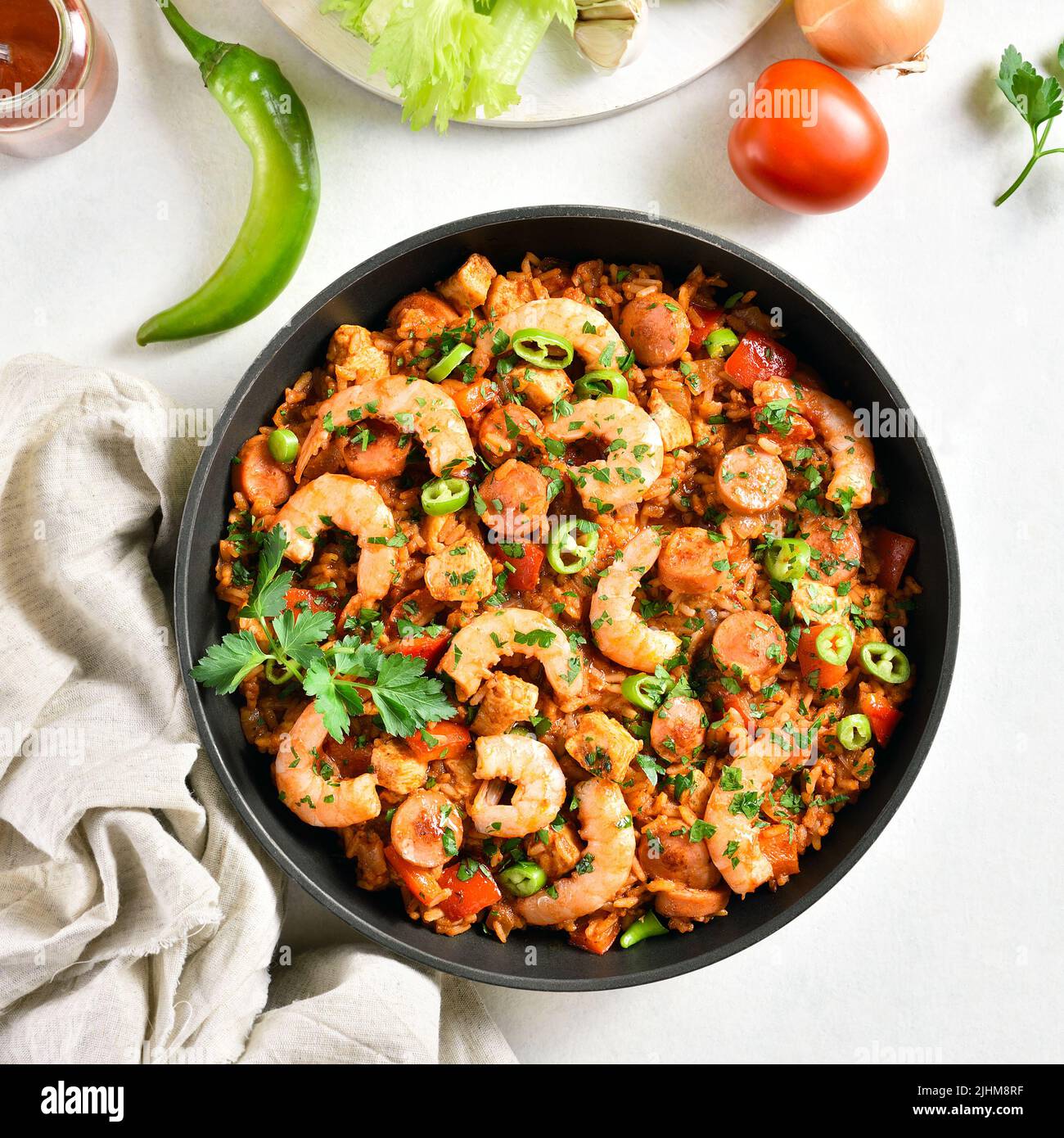 Creole jambalaya with chicken, smoked sausages and vegetables over