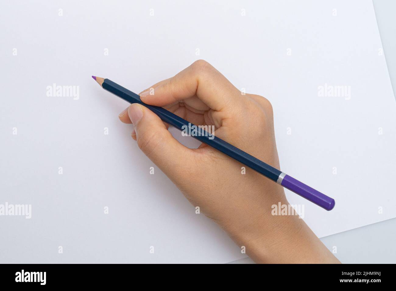 Various colored pencils on a white background Stock Photo