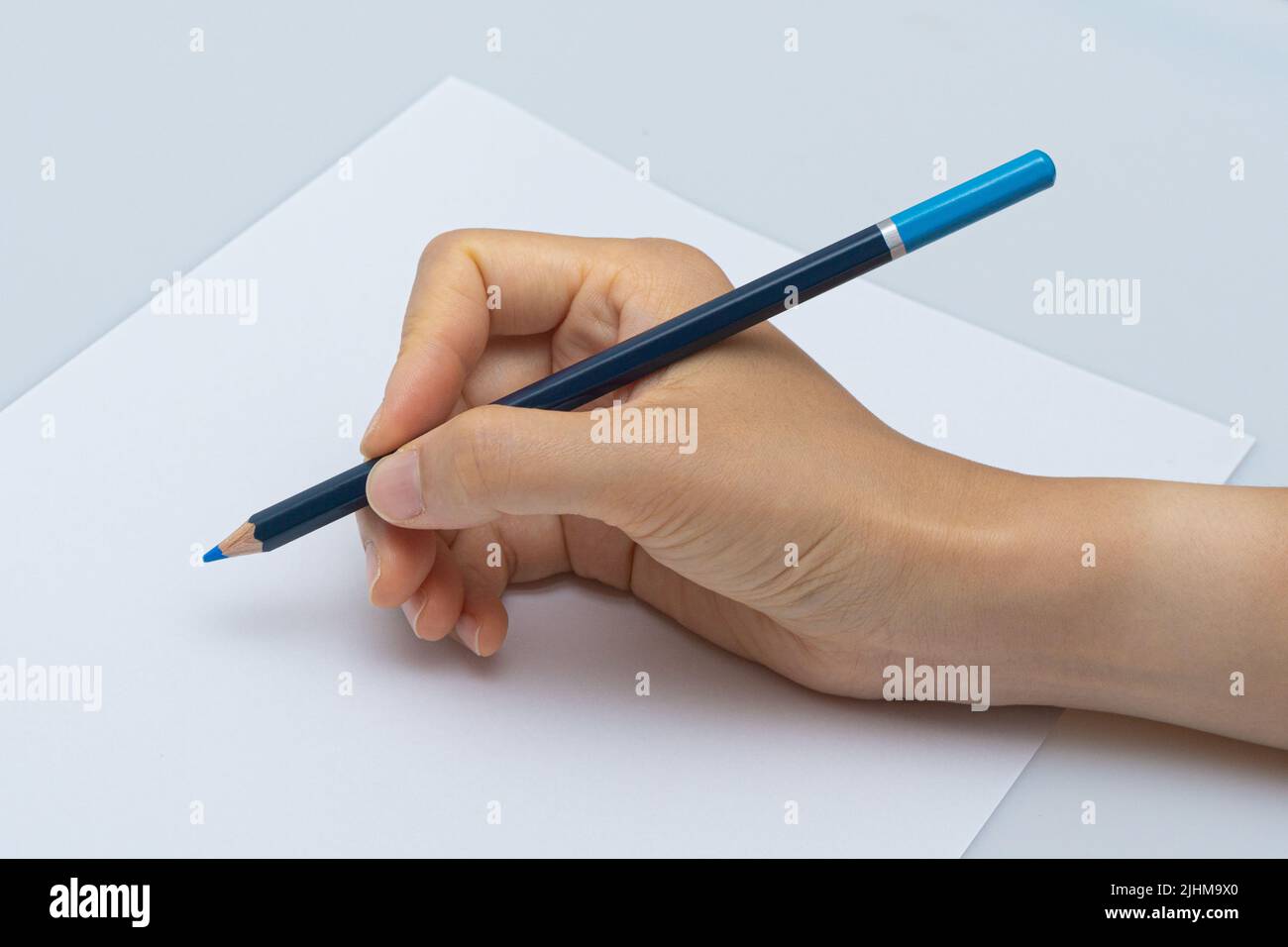 Various colored pencils on a white background Stock Photo