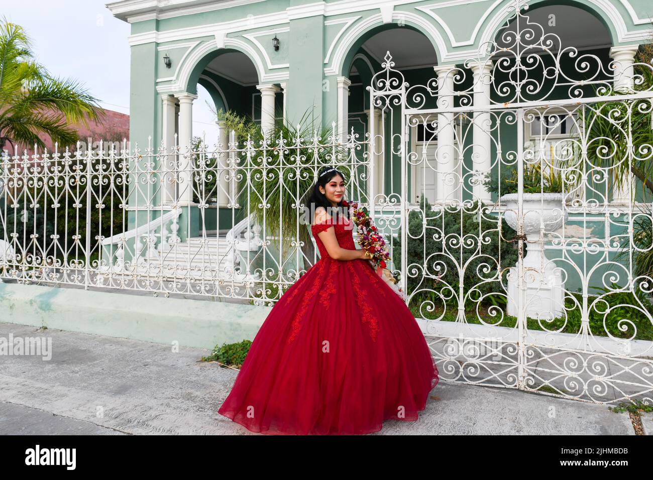 Girl celebrating her quinceañera (celebration of a girl's 15th birthday) in Merida, Yucatan Mexico Stock Photo
