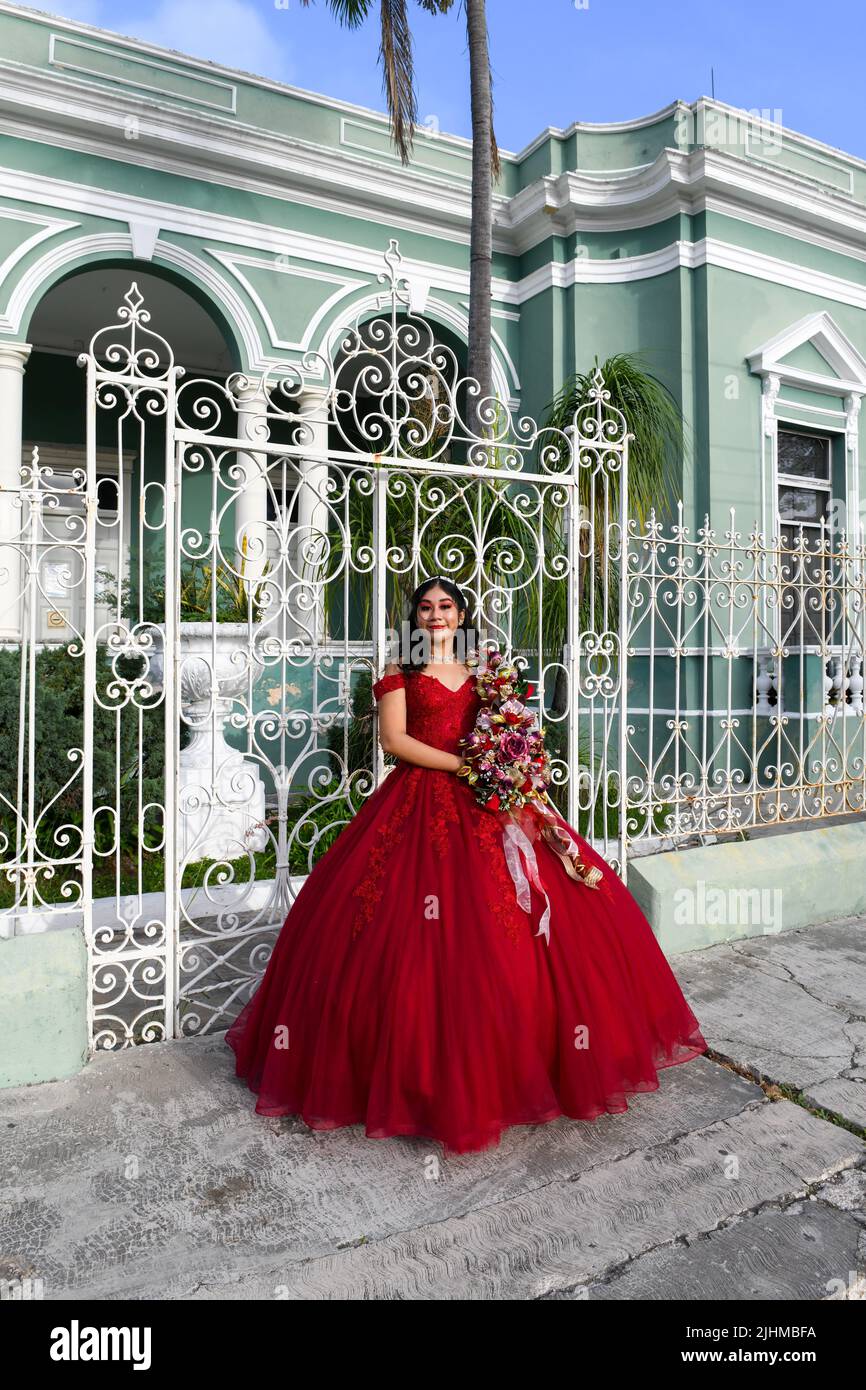 Girl celebrating her quinceañera (celebration of a girl's 15th birthday) in Merida, Yucatan Mexico Stock Photo