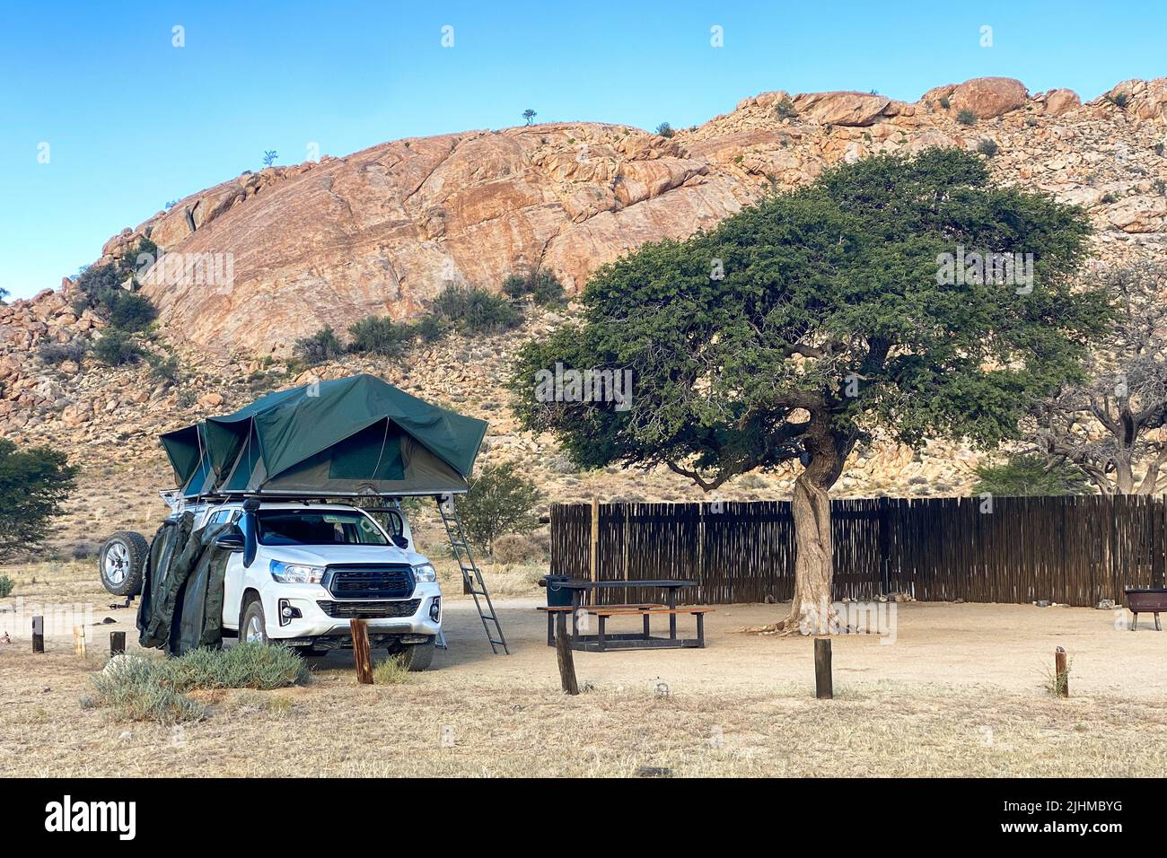 Camping in a roof tent on a 4x4 in Namibia in Africa Stock Photo