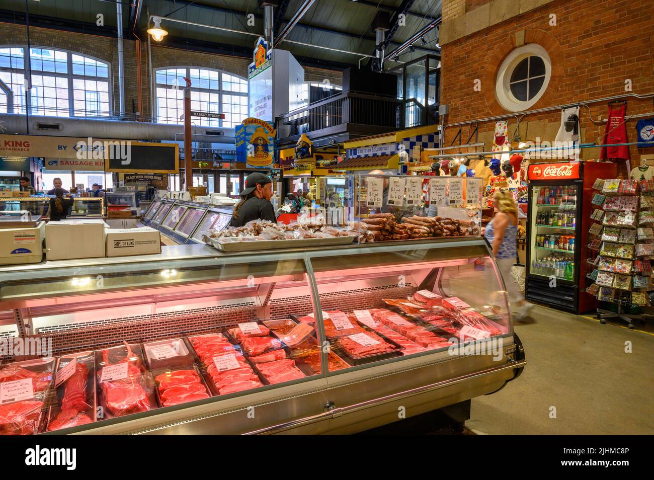 Inside St. Lawrence Market with meat stalls in downtown Toronto