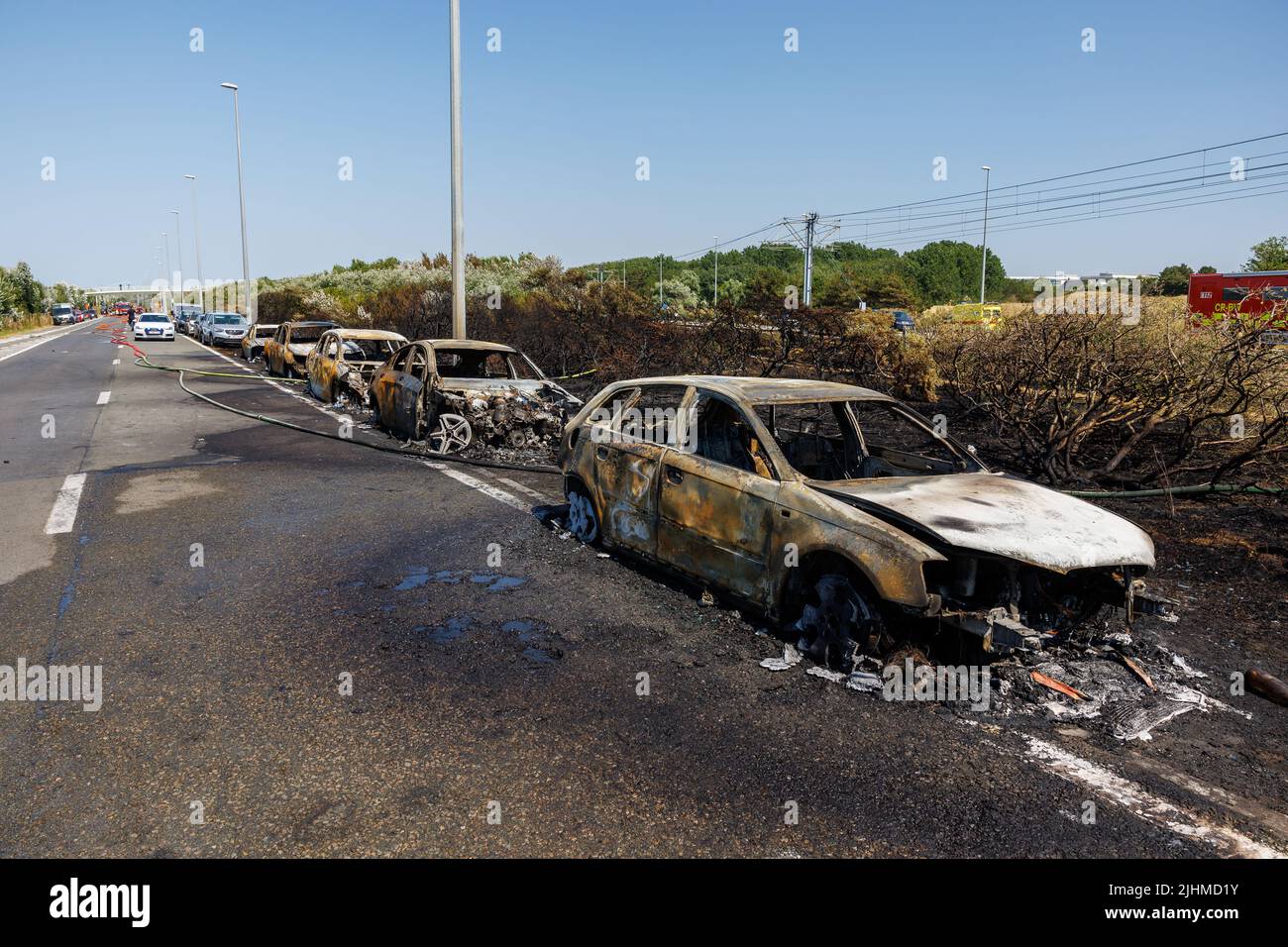 De Haan, Belgium, 19 July 2022. Burnt out cars pictured at on the scene of fires in the dunes at the Belgian coast in De Haan, caused by the heatwave on Tuesday 19 July 2022. The beaches have been evacuated. BELGA PHOTO KURT DESPLENTER Stock Photo