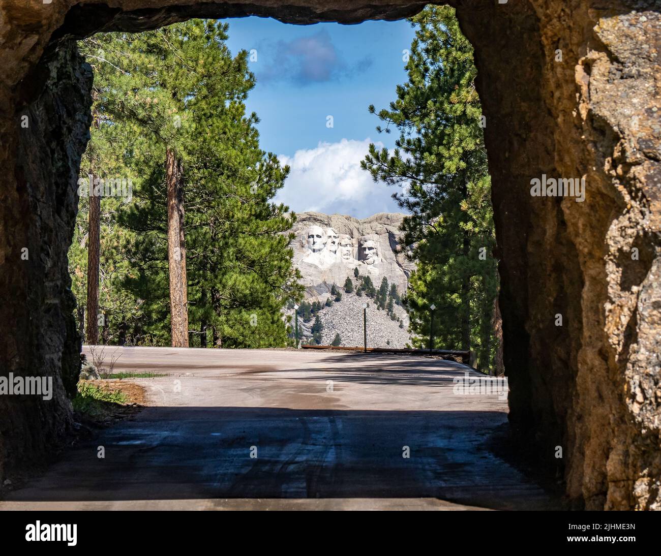 Mount Rushmore National Memorial though the Scovel Johnson Tunnel on Iron MountaIn Road part of the Peter Norbeck National Scenic Byway in the Black H Stock Photo