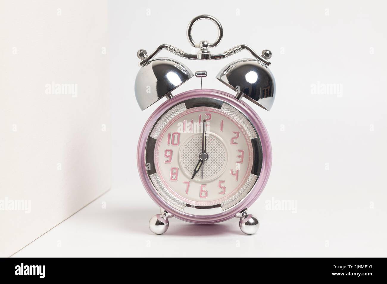 Alarm clock isolated on a white background Stock Photo - Alamy
