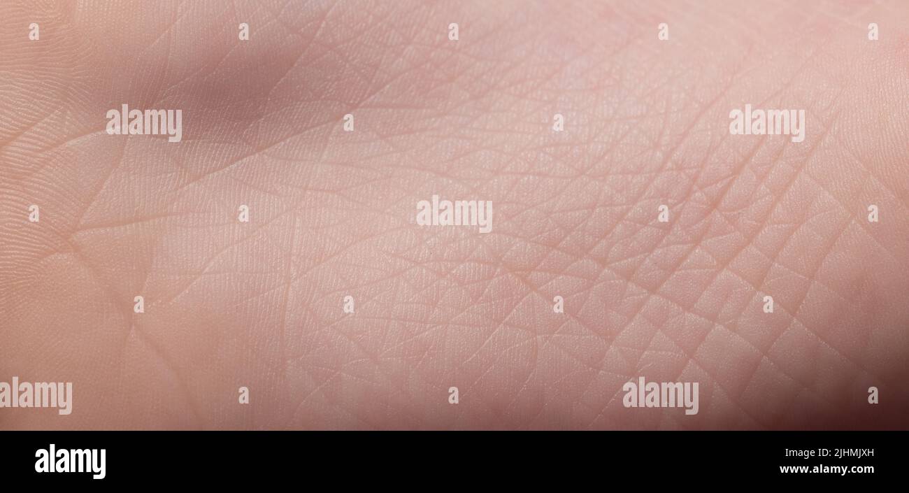 Skin on baby foot with wrinkled lines close up view Stock Photo
