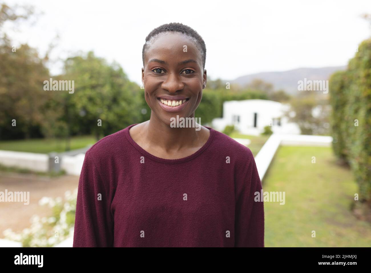 Image of happy african american woman posing at camera Stock Photo - Alamy