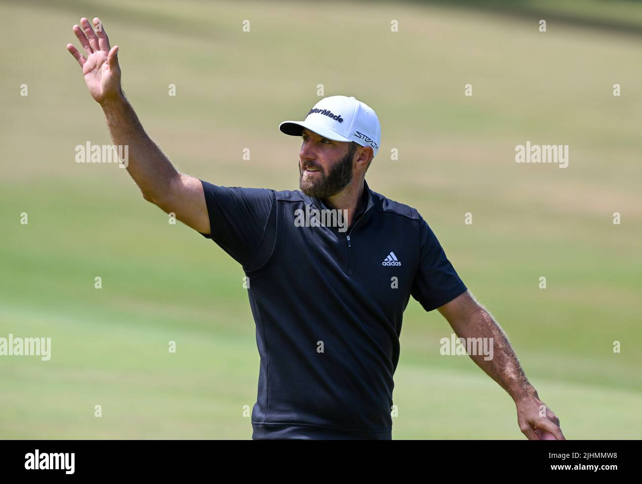 150th Open GolfChampionships, St Andrews, July 15th 2022 Dustin Johnson (USA) waves to crowd after finishing his second round at the Old Course, St An Stock Photo