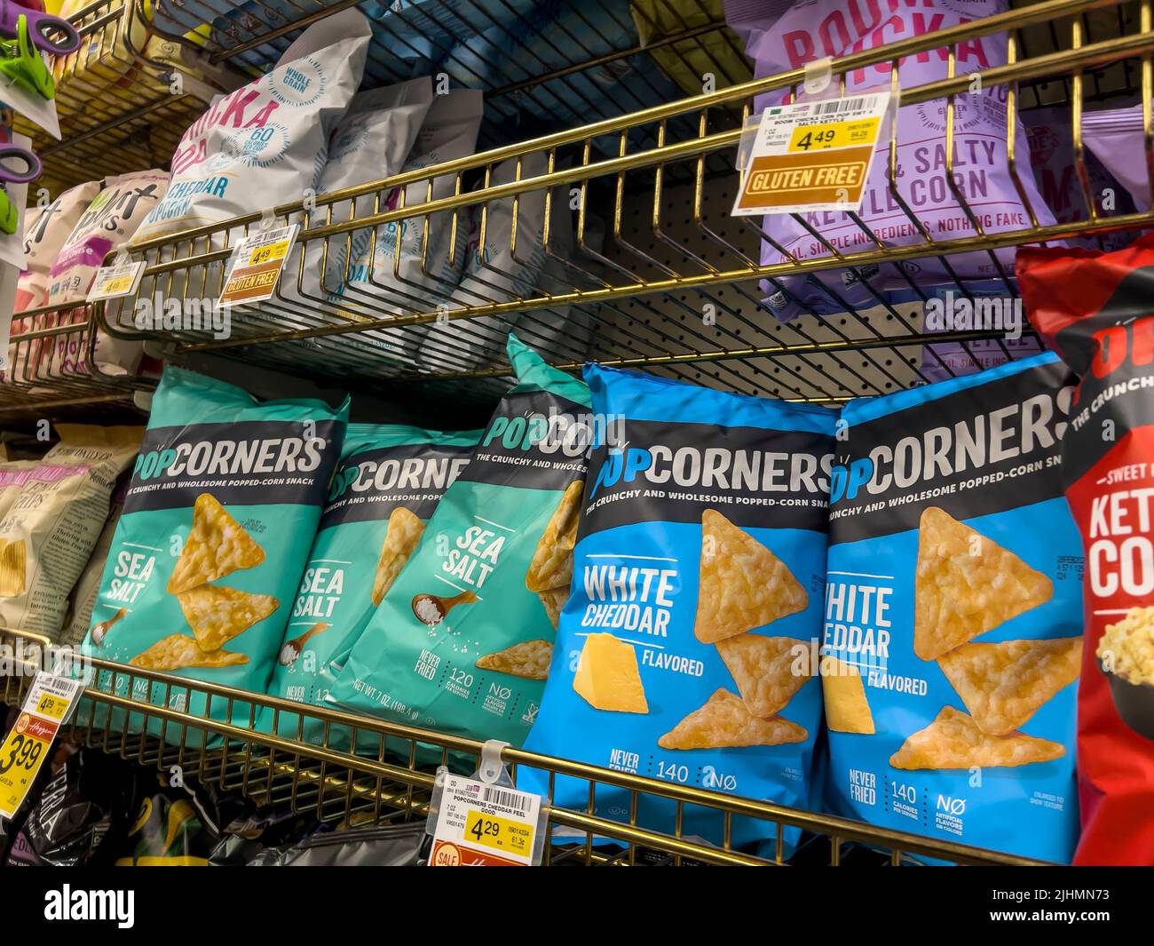 Woodinville, WA USA - circa May 2022: Angled view of Pop Corners brand corn chips for sale inside a Haggen grocery store. Stock Photo