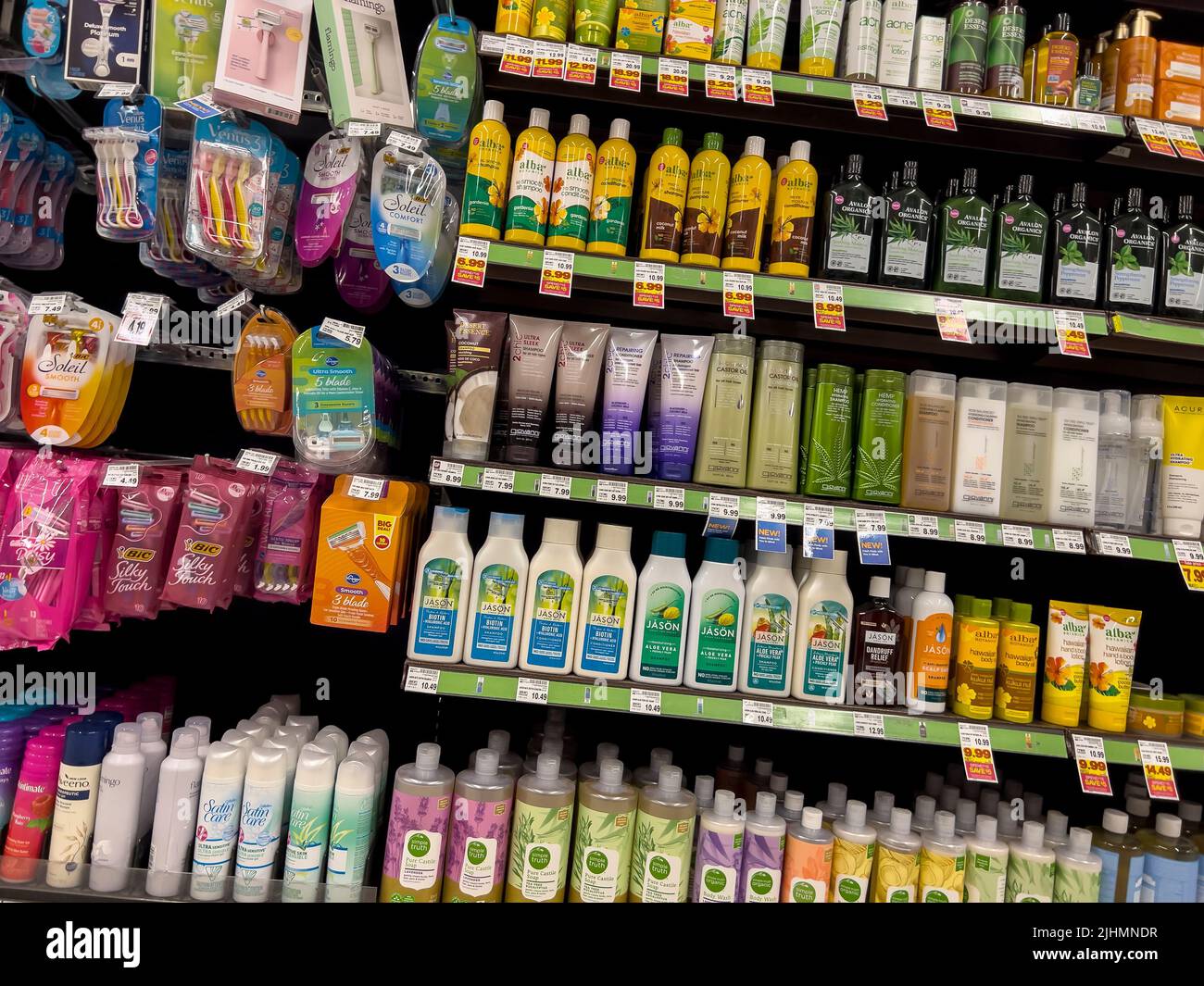 Seattle, WA USA - circa May 2022: View of womens shaving and bath care products for sale inside a QFC grocery store. Stock Photo