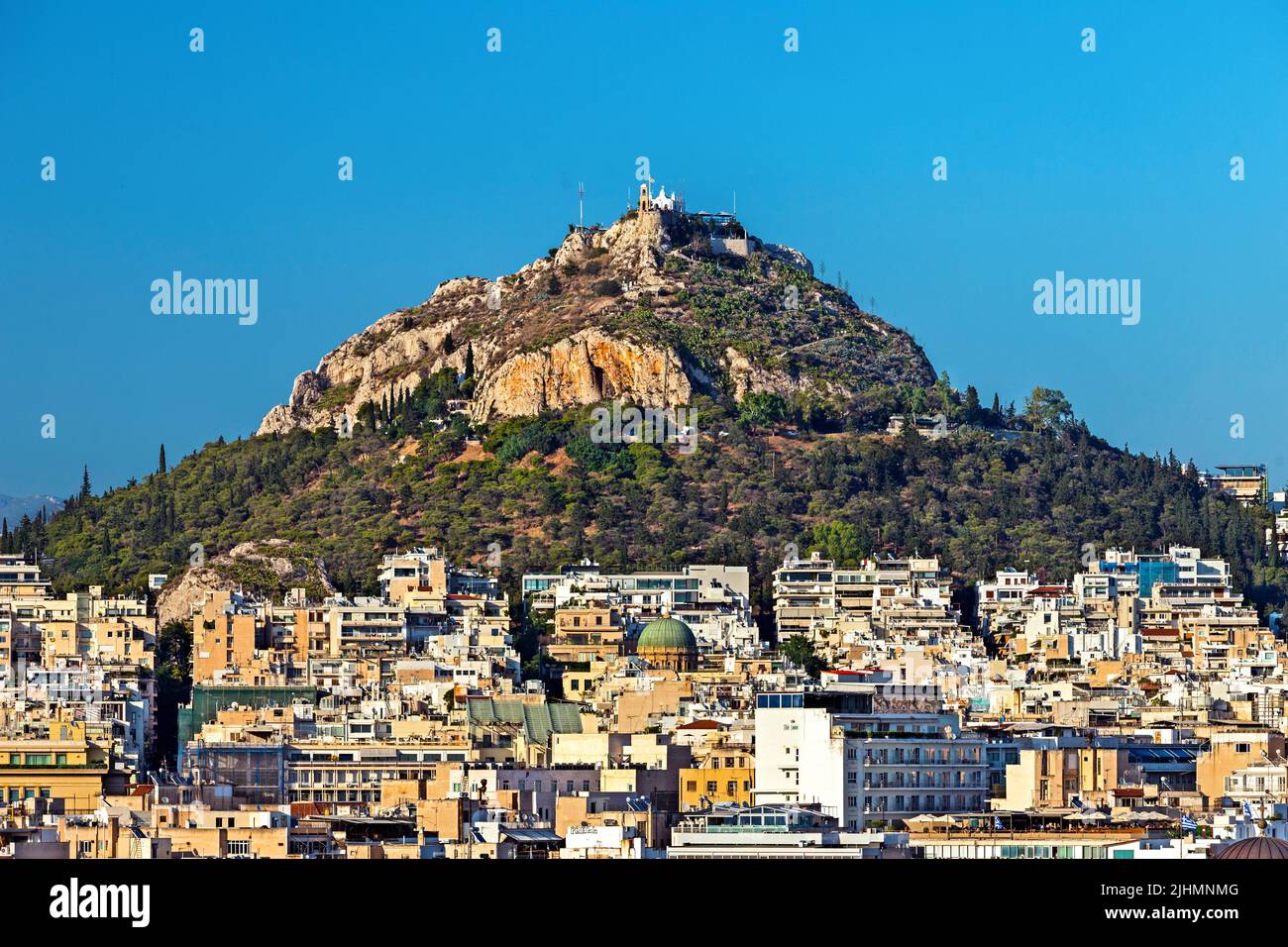 Lycabettus hill, the highest hill of Athens (Greece and its best viewpoint, with the church of Saint George on top. Stock Photo