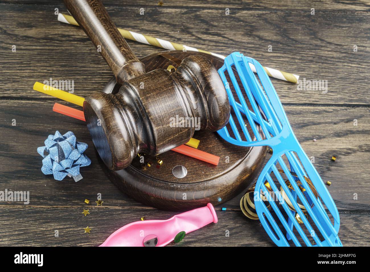 Gavel and various party items. Prohibition of entertainment events or violations of the rules of the organization of parties concept Stock Photo