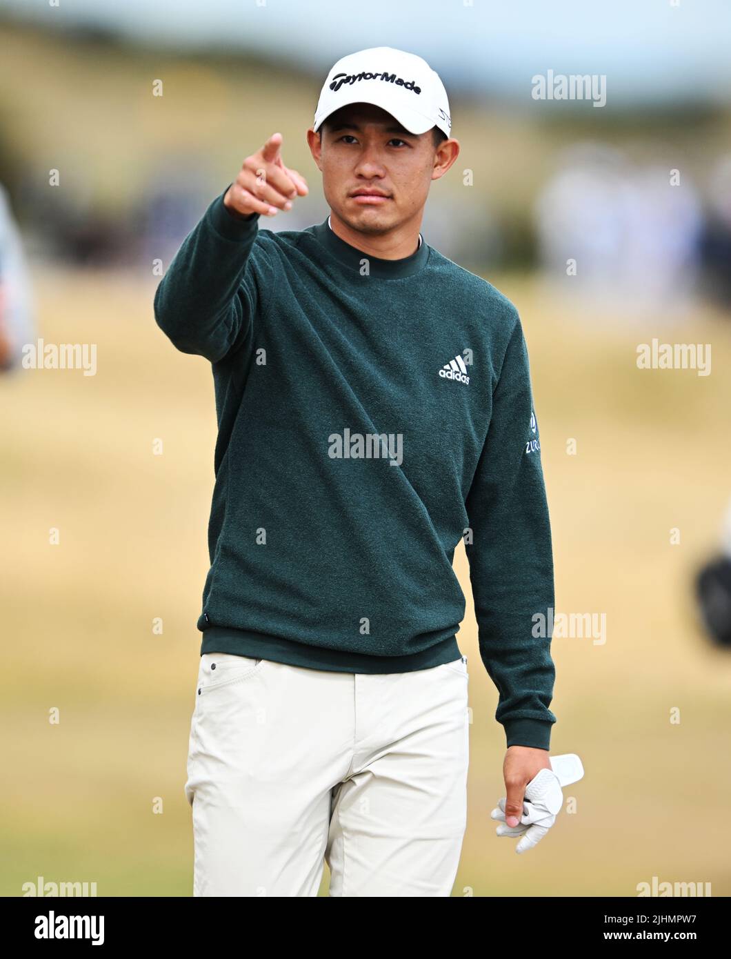 150th Open GolfChampionships, St Andrews, July 13th 2022 Collin Morikawa points as he walks up the 17th fairway during his practice round at the Old C Stock Photo