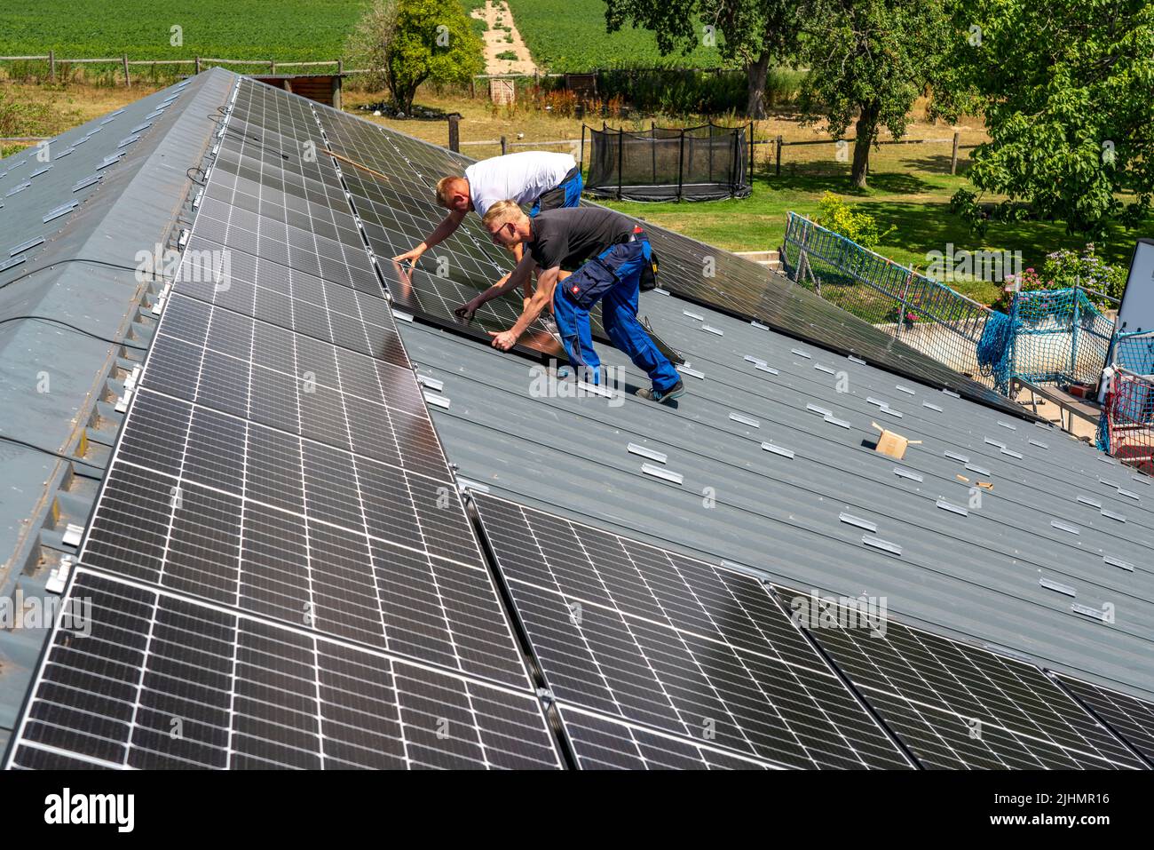 Installation of solar modules on the roof of a barn, a farm, over 240 ...