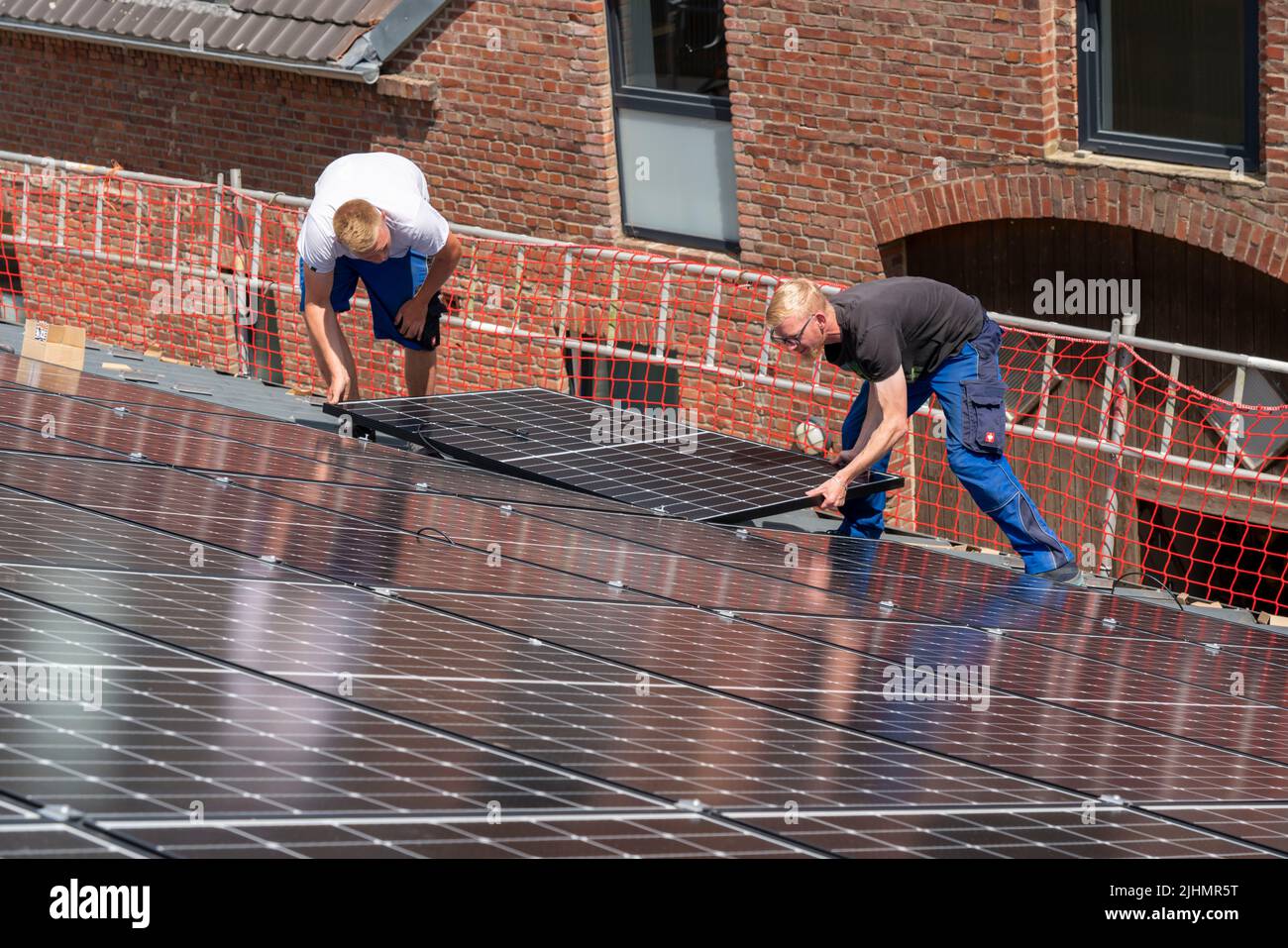 Installation of solar modules on the roof of a barn, a farm, over 240 ...