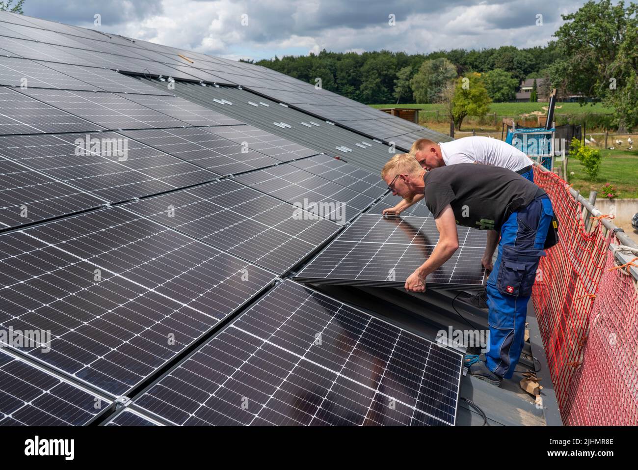 Installation of solar modules on the roof of a barn, a farm, over 240 ...