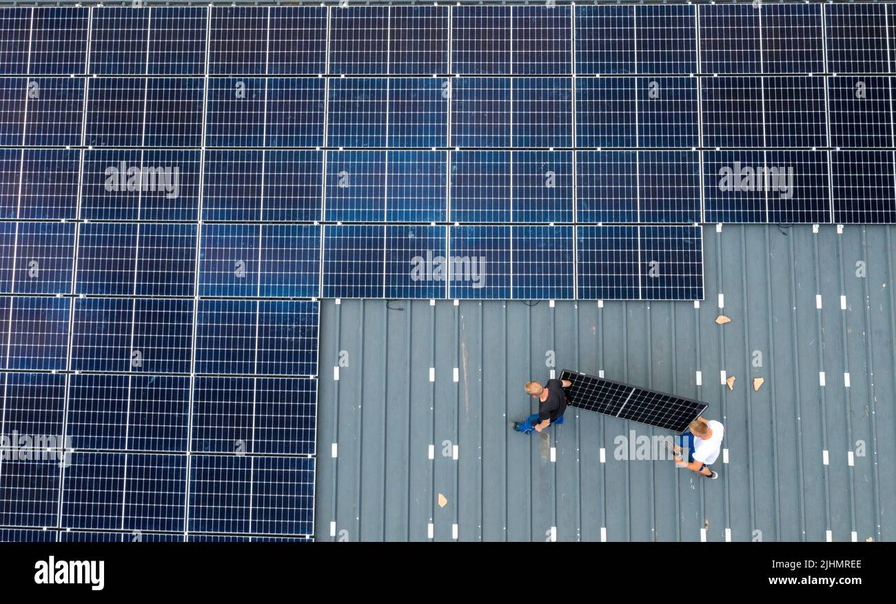 Installation of solar modules on the roof of a barn, a farm, over 240 ...
