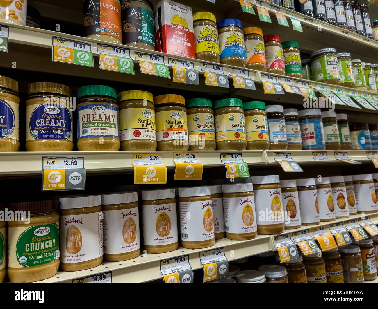 Seattle, WA USA circa June 2022 Angled view of various nut butters for sale inside a Sprouts