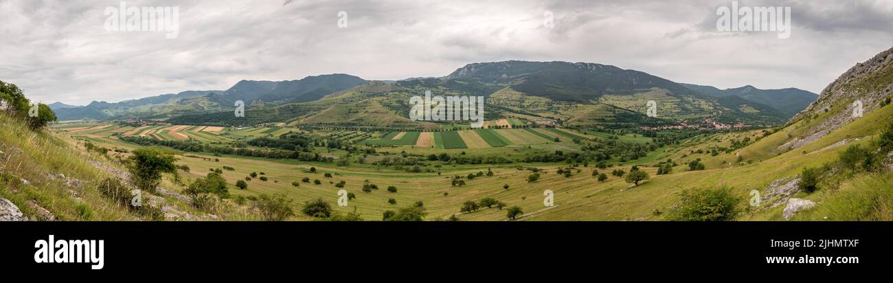 panoramic view of rimetea and coltesti from piatra secuiului massif Stock Photo