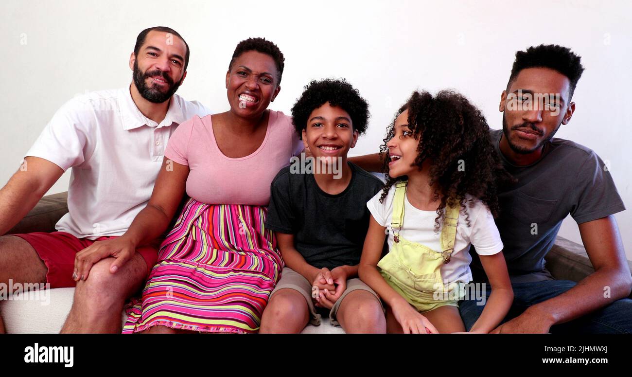 Mixed race family speaking in video long distance communication ...