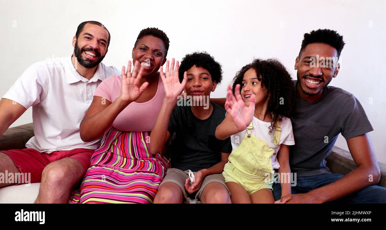 Mixed race family speaking in video long distance communication ...