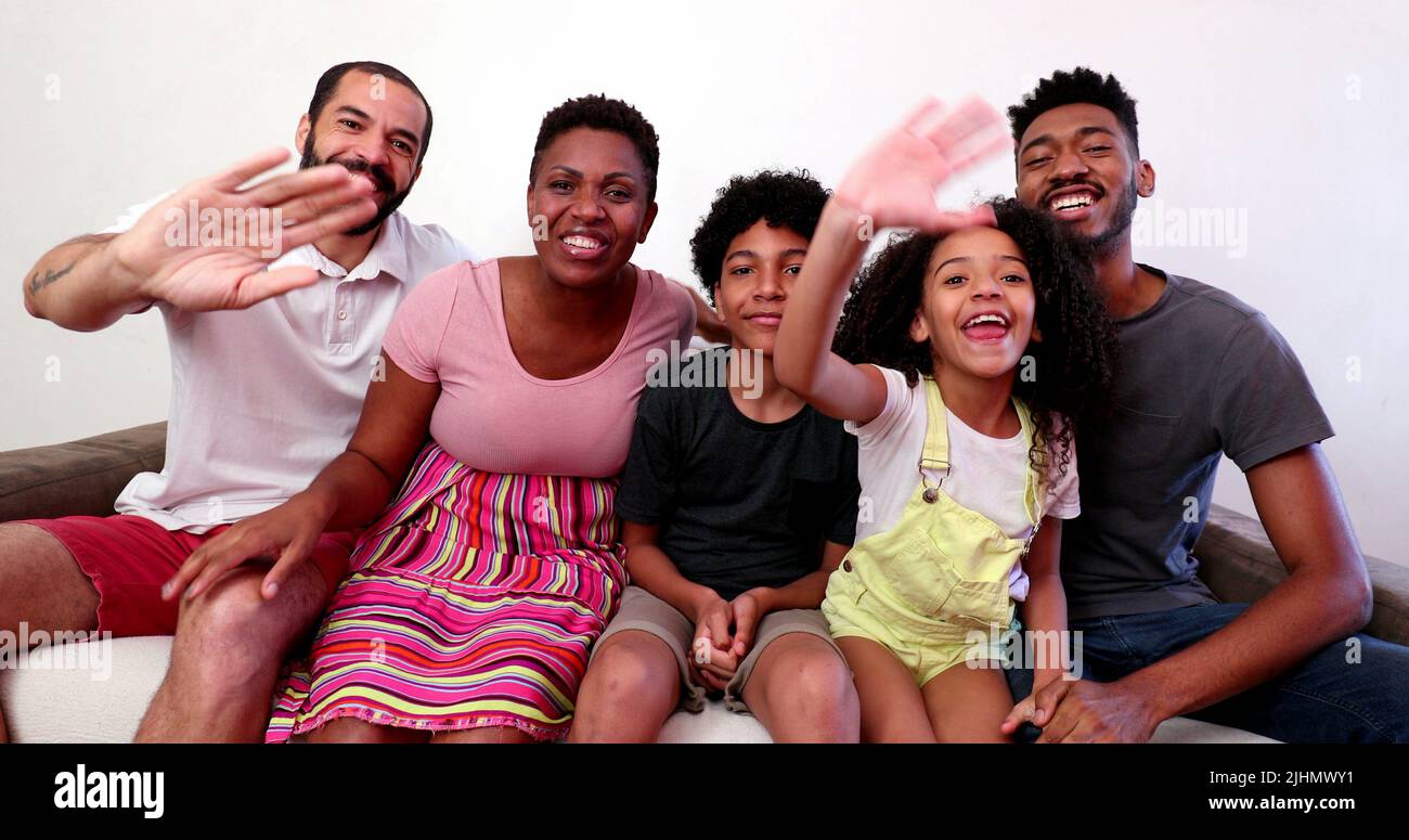 Mixed race family speaking in video long distance communication ...