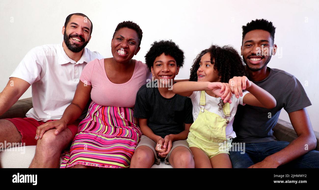 Mixed race family speaking in video long distance communication ...
