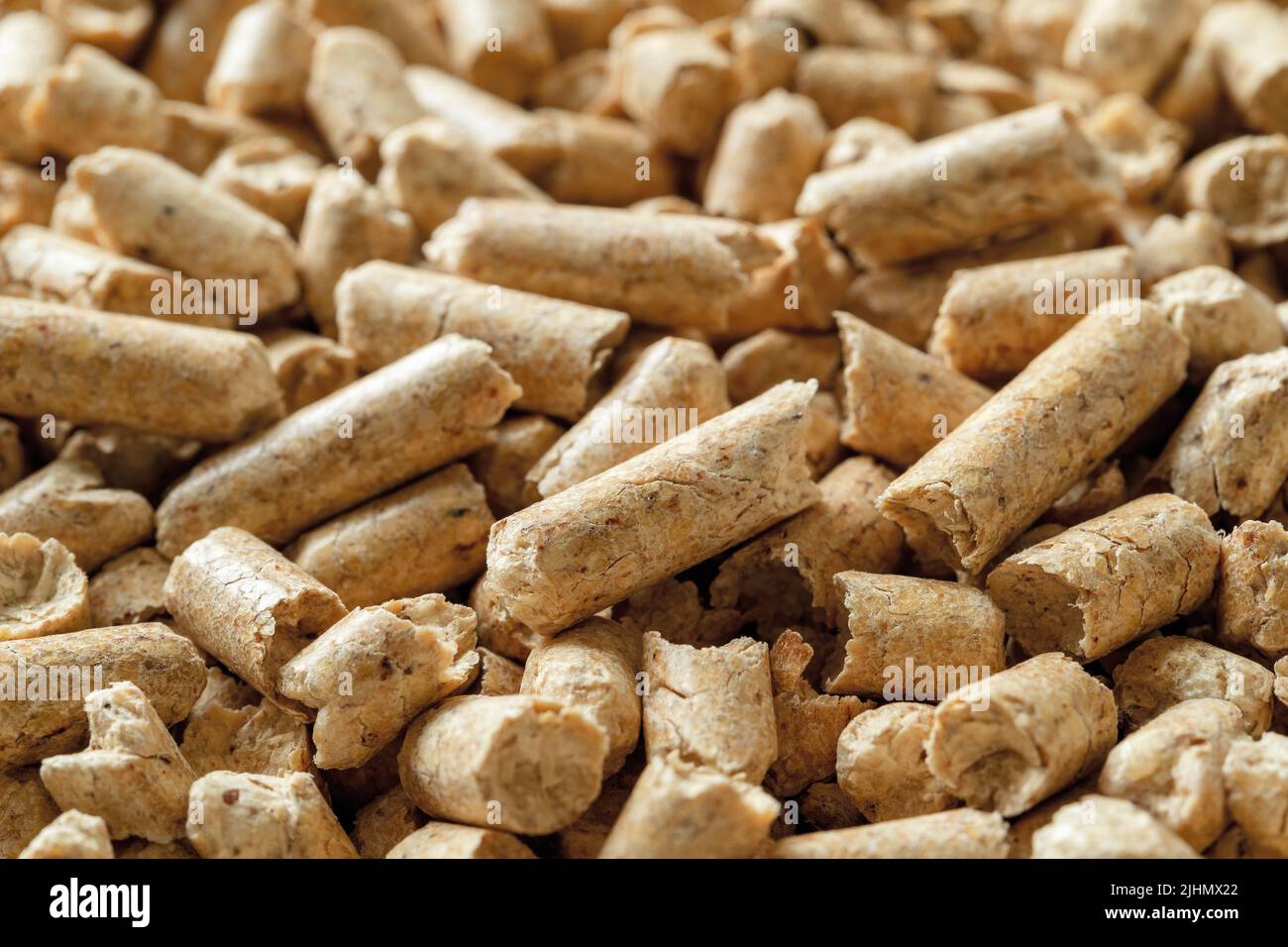 Wooden pellets macro background. Compressed sawdust granules texture ...