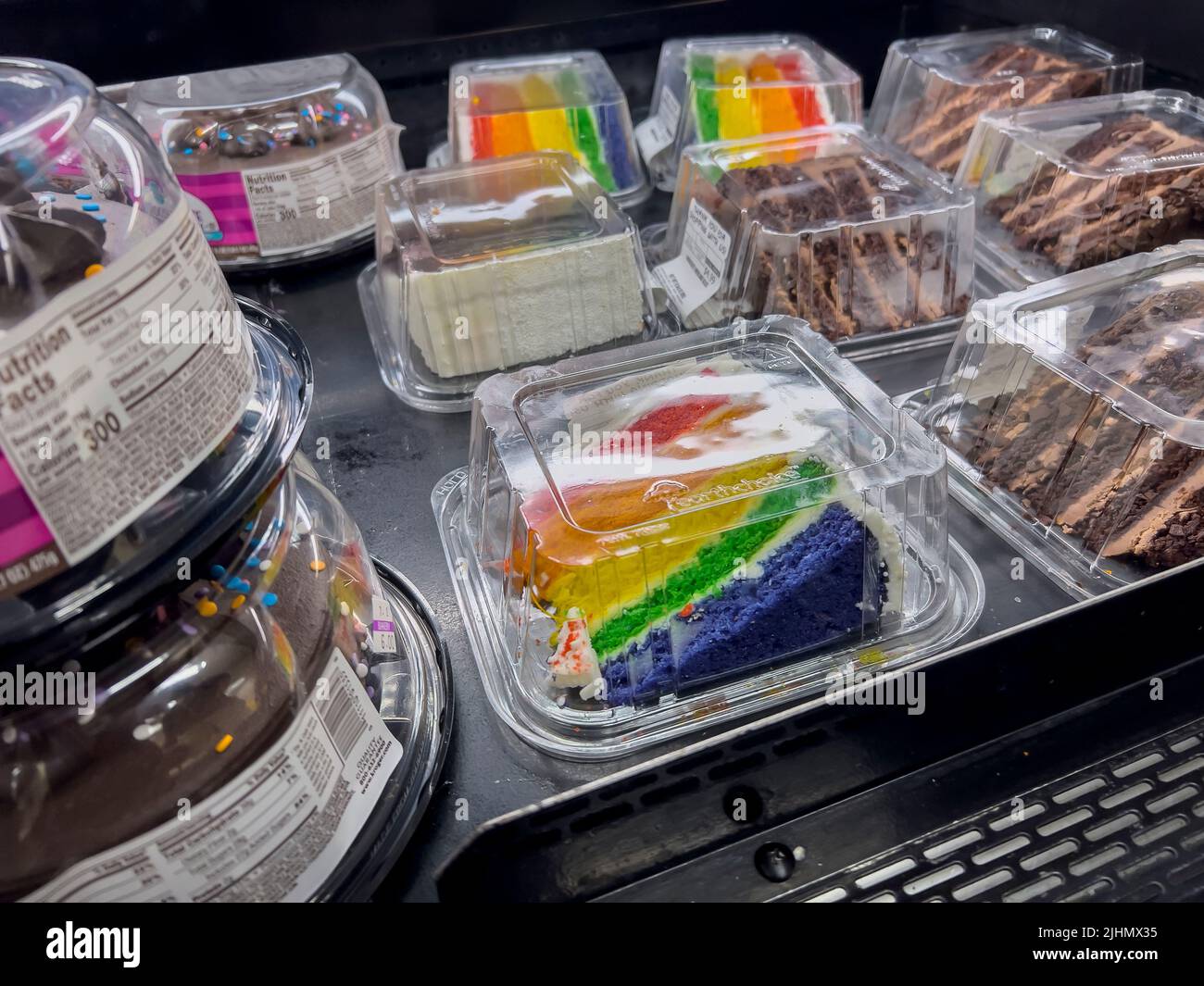 Seattle, WA USA - circa June 2022: Close up view of gay pride cake for sale inside a local grocery store. Stock Photo