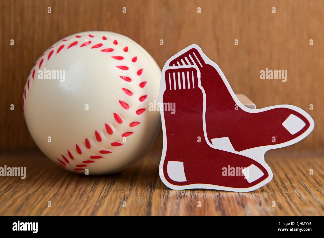 July 19, 2022, Cooperstown, New York. Emblem of the Boston Red Sox baseball club and baseball. Stock Photo