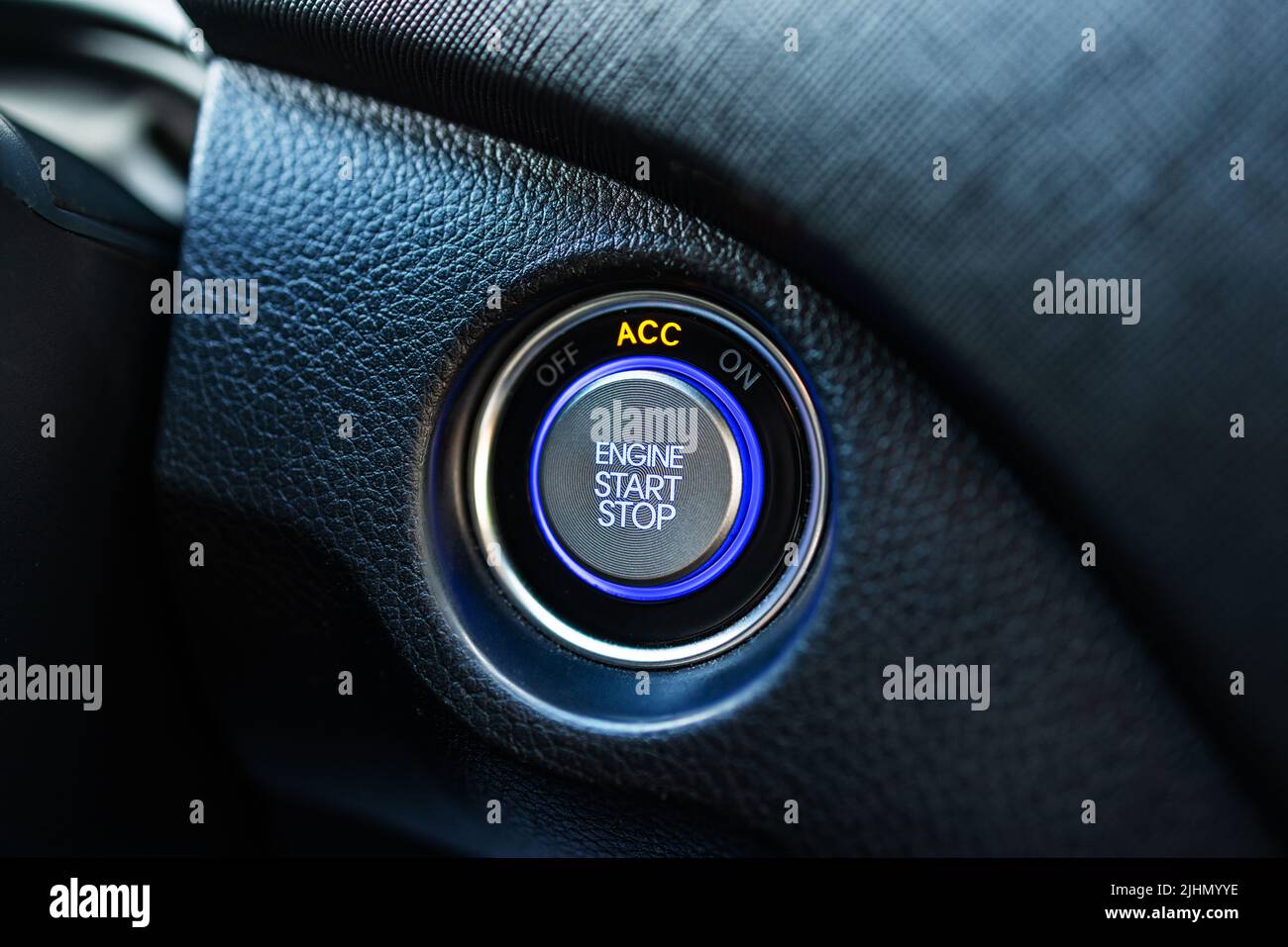 Engine start and stop button in modern car Stock Photo