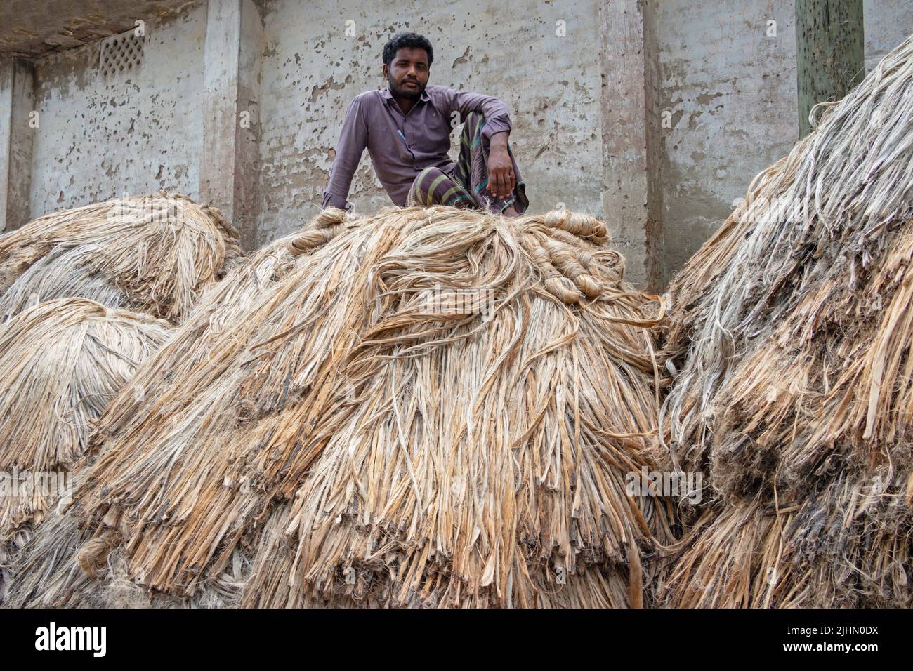 July 20, 2022, Manikganj, Dhaka, Bangladesh Jute Sellers wait for