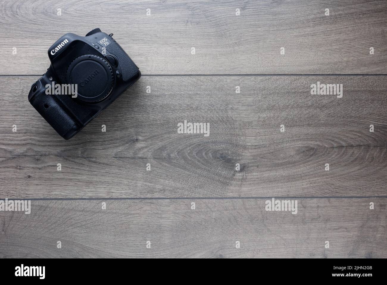 Canon 7D camera flat lay on wooden background Stock Photo